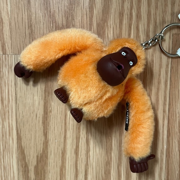 Kipling Vibrant Orange Plush Keychain - Picture 4 of 9